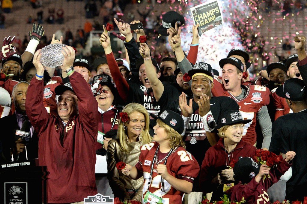 PASADENA, CA - JANUARY 06: Florida State Seminoles head coach Jimbo Fisher holds the Coaches' Trophy after defeating the Auburn Tigers 34-31 in the 2014 Vizio BCS National Championship Game at the Rose Bowl on January 6, 2014 in Pasadena, California. (Photo by Harry How/Getty Images)
