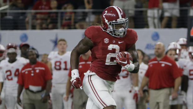 Alabama running back Derrick Henry rushes for a touchdown during the first half of an NCAA college football game against Wisconsin, Saturday, Sept. 5, 2015, in Arlington, Texas. (AP Photo/LM Otero)