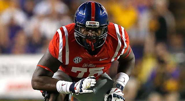 Mississippi Rebels offensive lineman Laremy Tunsil (78) lines up in position during an NCAA college football game against the LSU Tigers at Tiger Stadium on Saturday, October 25, 2014 in Baton Rouge, Louisiana. LSU won 10-7. (AP Photo/Aaron M. Sprecher)